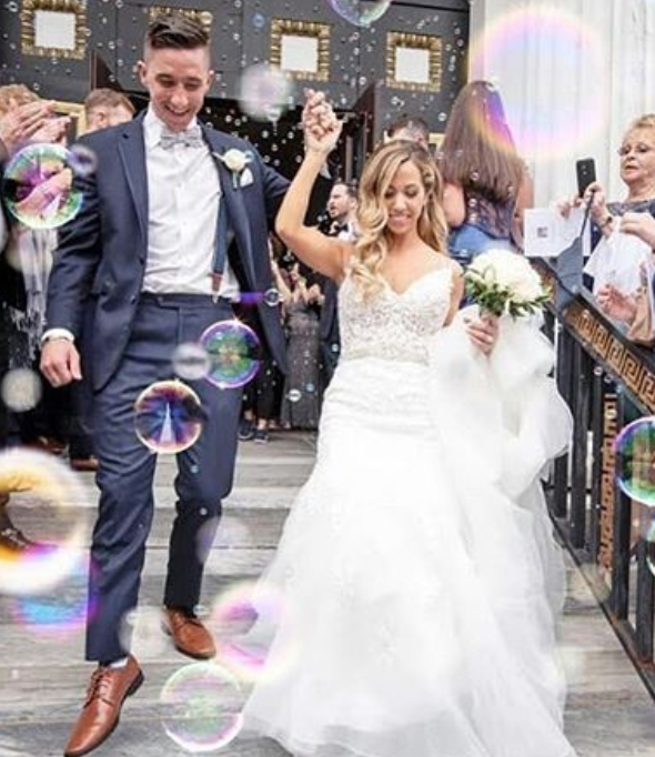 Bride in white Hayley Paige dress