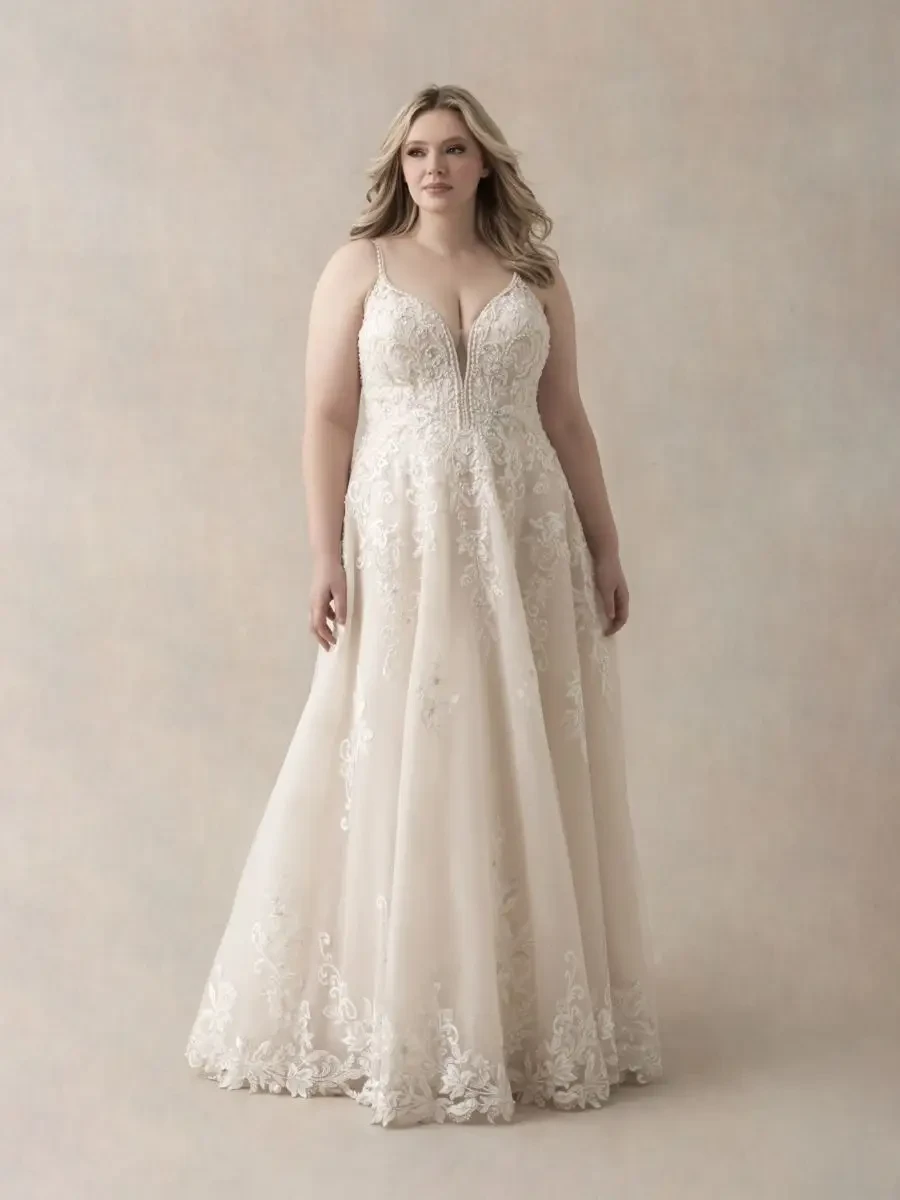 model is wearing a sleeveless lace bridal gown